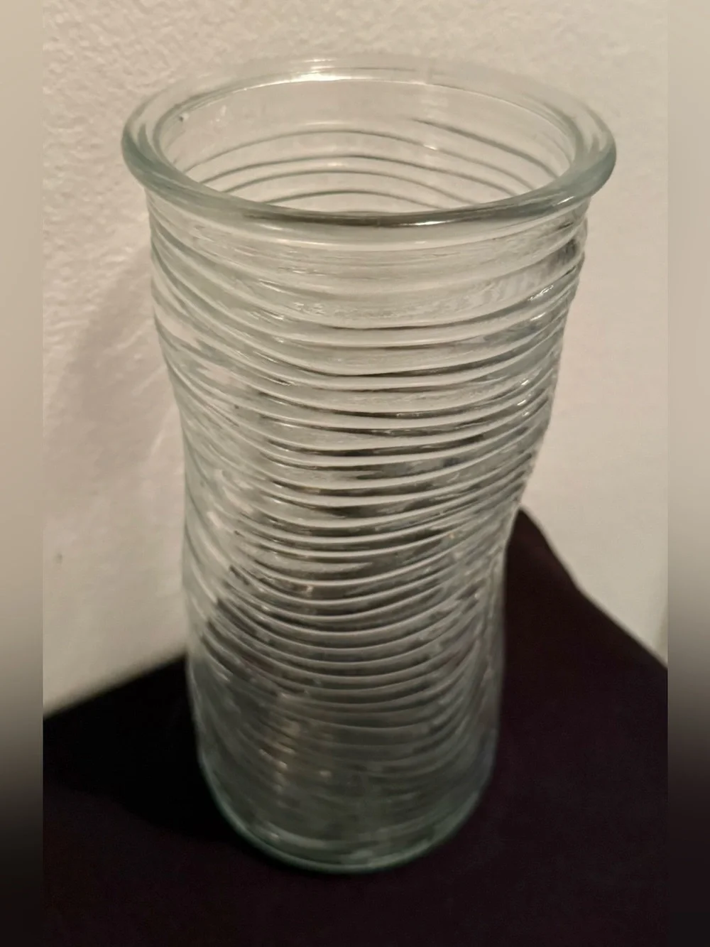 Ribbed glass vase, wavy, pinched shape. Mid-Century Modern design. 9.75”